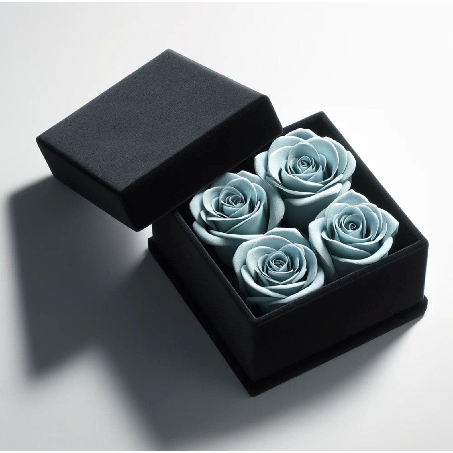 Serene Light Blue Forever Roses in Black Velvet Box - Imaginary Worlds